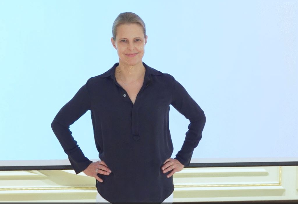 bettina speaker arms on hips